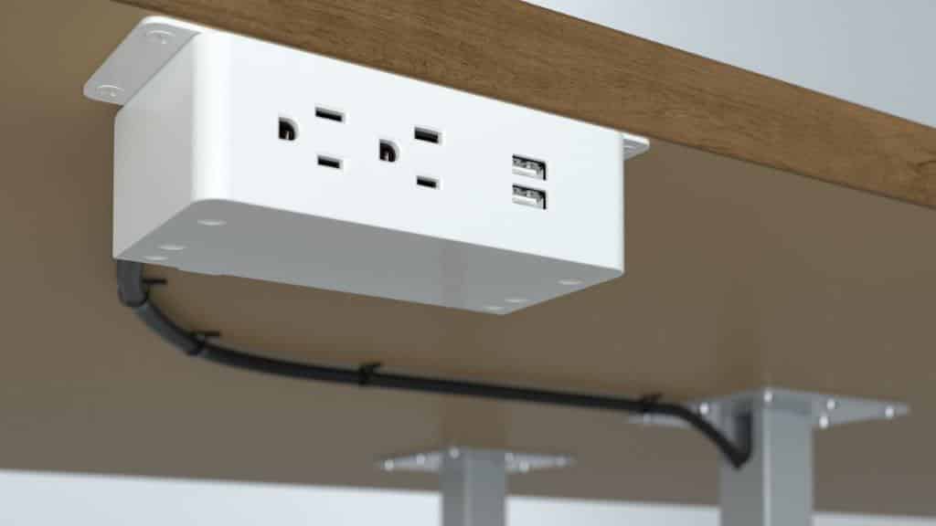 Underside view of Slick power add-on with two USB and two outlets in white